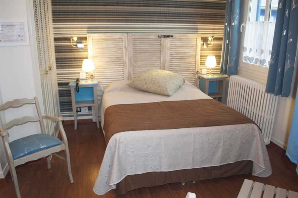 Hotel D'Arromanches Pappagall ภายนอก รูปภาพ